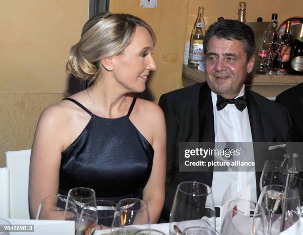 German Foreign Minister Sigmar Gabriel and his partner Anke Stadler celebrating at the 45th German Film Ball in the Bayerischer Hof in Munich,...