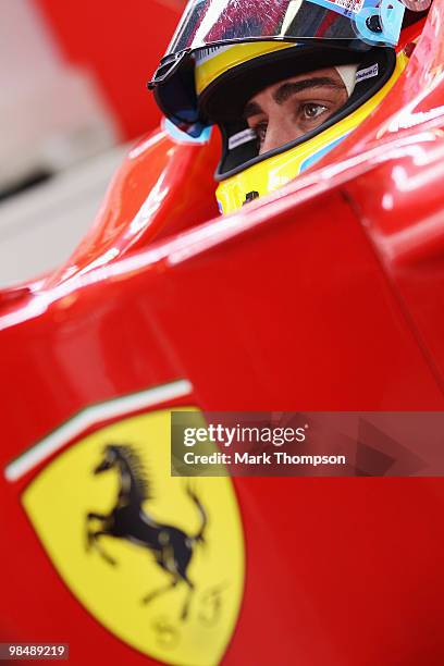 Fernando Alonso of Spain and Ferrari prepares to drive during practice for the Chinese Formula One Grand Prix at the Shanghai International Circuit...