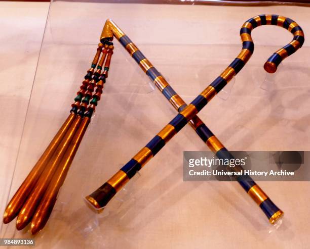 Flail and Sceptre. Found in the Tomb of King Tutankhamen. Made from gilded wood. Bronze. Carnelian and Glass. New Kingdom. Valley of the Kings. Luxor.