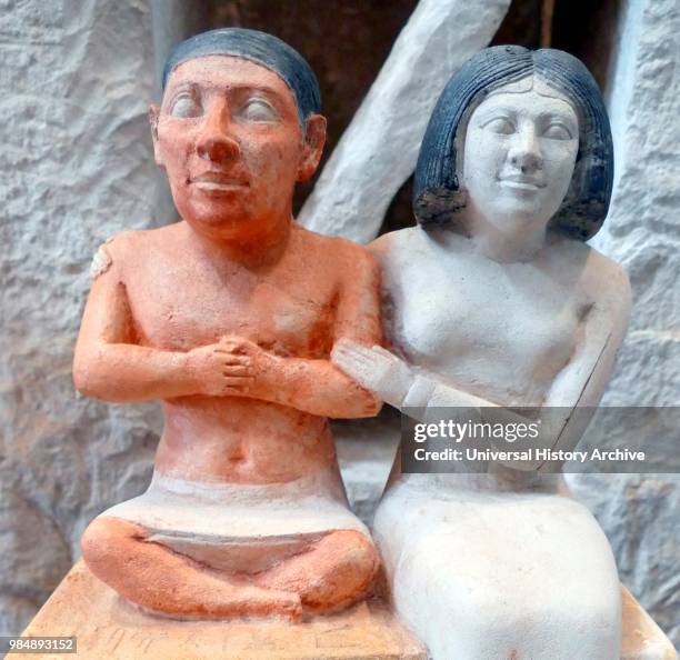 The dwarf Seneb. Chief of all the Dwarfs of the Clothing. And his wife. Found. In the stone naos embedded in the brickwork of his tomb. Painted...