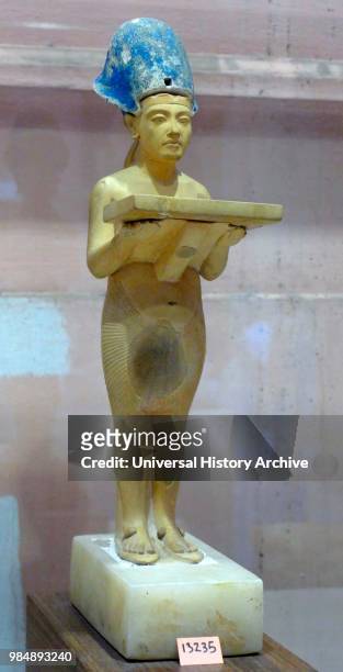 Gilded statuette of King Akhenaten of Egypt. Found in Tel el Amarna. The capital of Akhenaten's Egypt. Akhenaten. Known before the fifth year of his...