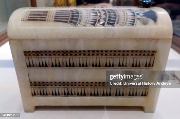 Alabaster wedding casket from the tomb of King Tutankhamen. Carved from a single block of calcite. Engraved with the cartouches of both the pharaoh...