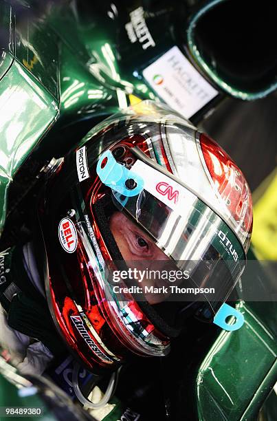 Jarno Trulli of Italy and Lotus prepares to drive during practice for the Chinese Formula One Grand Prix at the Shanghai International Circuit on...