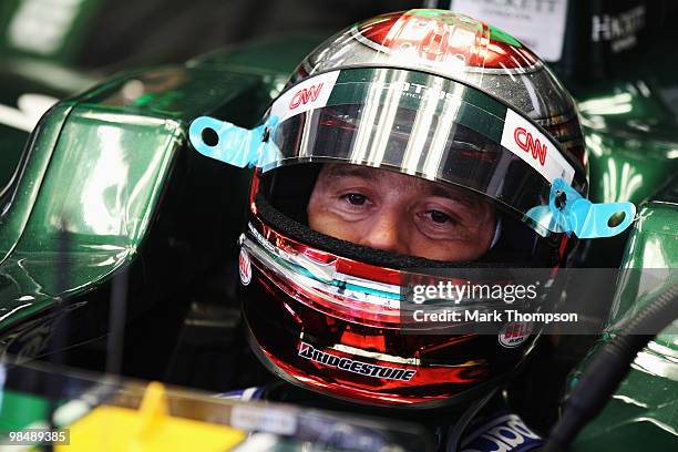 Jarno Trulli of Italy and Lotus prepares to drive during practice for the Chinese Formula One Grand Prix at the Shanghai International Circuit on...