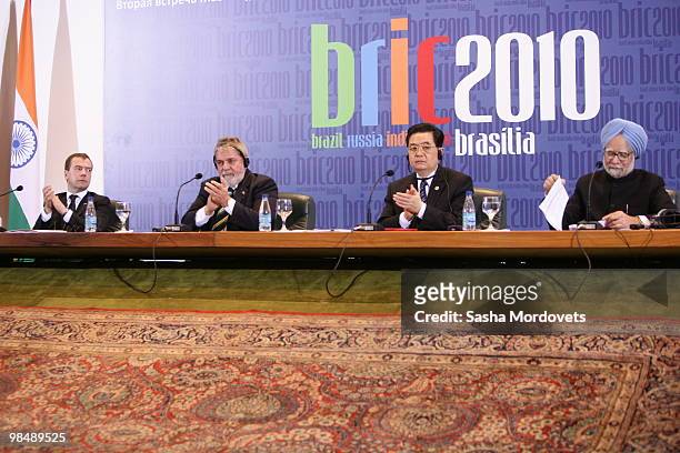 Russian President Dmitry Medvedev, Brazilian President Luiz Inacio Lula da Silva, Chinese President Hu Jintao, and Indian Prime Minister Manmohan...