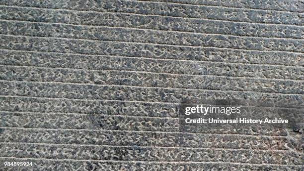 Sandstone stela inscribed in Meroitic script. Found in a ruined building south of Meroe. It is largely indecipherable but the names of Queen...