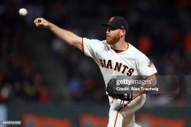 Sam Dyson of the San Francisco Giants pitches during a game against the Colorado Rockies at AT&T Park on Tuesday, June 26, 2018 in San Francisco,...