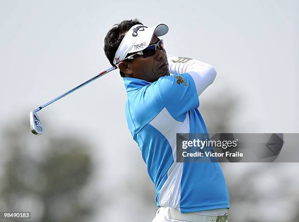 Thongchai Jaidee of Thailand plays his second shot on the 1st hole during the Round Two of the Volvo China Open on April 16, 2010 in Suzhou, China.