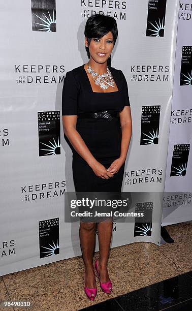 Media personality Tamron Hall poses for a photo on the red carpet at the 12th annual Keepers Of The Dream Awards at the Sheraton New York Hotel &...