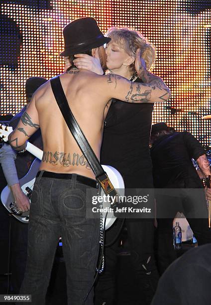 Dave Navarro and Courtney Love perform with Camp Freddy at Hollywood & Highland Courtyard on April 15, 2010 in Hollywood, California.