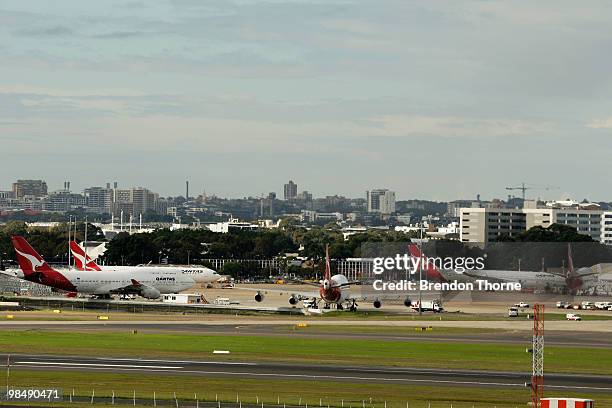 Mass of grounded Qantas jets line the airport as flights are delayed and cancelled following the eruption of iceland's Eyjafjallajokull volcano, at...