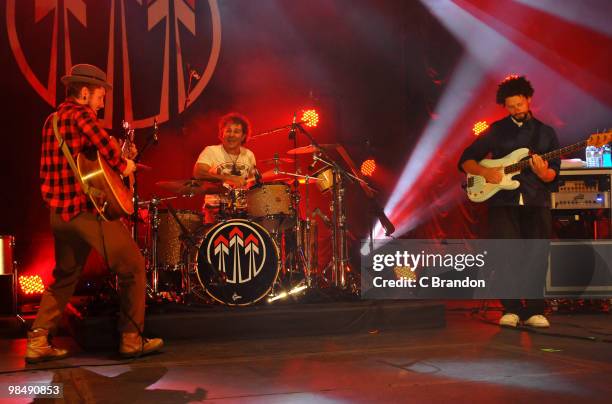 John Butler, Nicky Bomba and Byron Luiters of the John Butler Trio perform on stage at Hammersmith Apollo on April 14, 2010 in London, England.