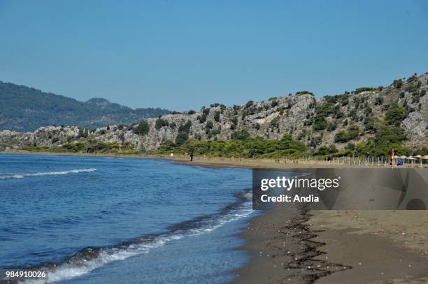 Dalyan. Tourists on Iztuzu Beach, in the Dalyan delta. Protected natural site, well-known for the presence of blue crabs and loggerhead sea turtles ,...
