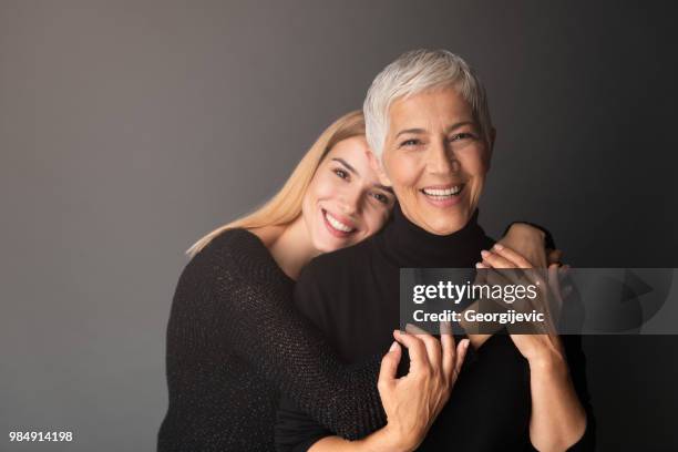 moment with mother - beautiful grandmothers stock pictures, royalty-free photos & images