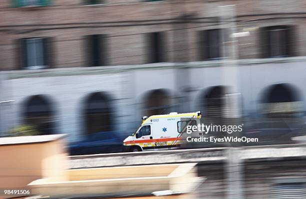 Ambulance with siren race trough the city on June 14, 2009 in Ancona, Italy. Ancona is a big ferry port to Greece.