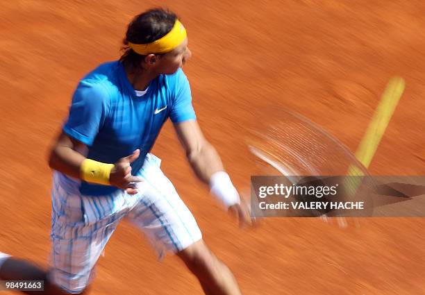 Spanish Rafael Nadal hits a return to German Michael Berrer during their Monte Carlo ATP Masters Series tournament tennis, on April 15, 2010 in...