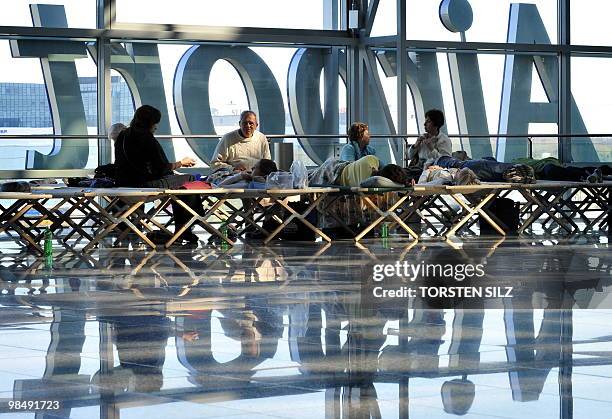 Passengers use camp beds as they wait for the resumption of air travel on April 16, 2010 at the airport in Frankfurt/M. Flights at Frankfurt airport,...