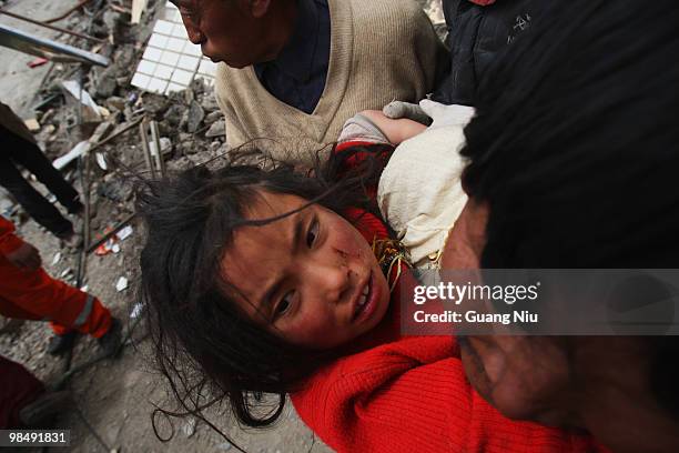 Year old girl is rescued from the rubble following a strong earthquake, on April 16 in Jiegu, near Golmud, China. It is currently reported that 791...