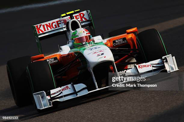 Vitantonio Liuzzi of Italy and Force India drives during practice for the Chinese Formula One Grand Prix at the Shanghai International Circuit on...