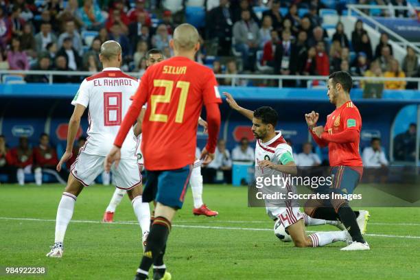 Mbark Boussoufa of Morocco , Thiago of Spain during the World Cup match between Spain v Morocco at the Kaliningrad Stadium on June 25, 2018 in...