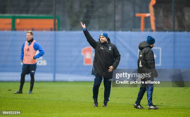 Bernd Hollerbach, new lead trainer of the Bundesliga team Hamburger SV, gesticulates during a training session in Hamburg, Germany, 22 January 2018....