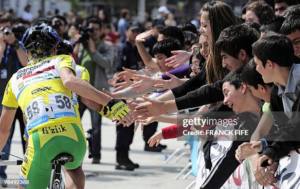 Fans cheer on Russian cyclist Andrei Sartassov prior to the start of the 5th stage of the 2010 Tour of Turkey cycling race run between Denizli and...