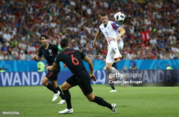 Johann Gudmundsson of Iceland controls the ball during the 2018 FIFA World Cup Russia group D match between Iceland and Croatia at Rostov Arena on...