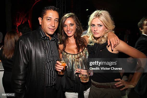 Rene Artola, Carla Crescitelli and Barbara Turanova attend the Tommy Hilfiger 15th anniversary party at Museo de Arte Moderno on April 14, 2010 in...