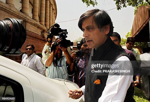 Indian Junior Foreign Minister Shashi Tharoor leaves after addressing journalists at parliament house in New Delhi on April 16, 2010. Junior Indian...