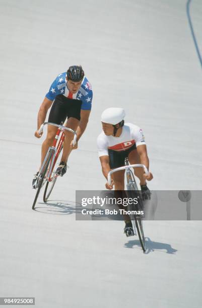 American sprint cyclist Mark Gorski of the United States team pictured on left in action competing against Tsutomu Sakamoto of Japan in heat 1of the...