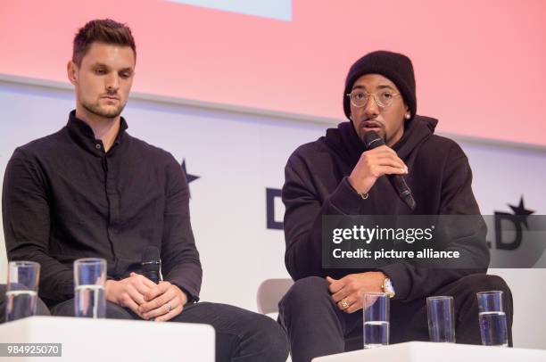 Dpatop - Bayern Munich goalkeeper Sven Ulreich and teammate Jerome Boateng, attend the innovation conference Digital-Life-Design in Munich, Germany,...