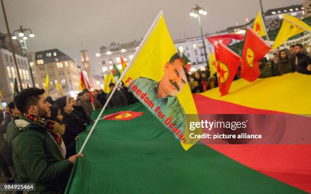 Pro-Kurdish demonstrators protest against the Turkish military offensive in Northern Syria at Hamburg's Town Hall Square, Germany, 22 January 2018....