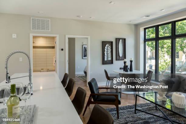 Living area and Kitchen Island in model unit 101 at Stone Hill on June 12, 2018 in Washington DC.