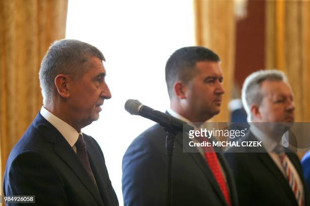 Czech Prime Minister Andrej Babis and Social Democrat leader and new Czech Interior Minister Jan Hamacek attend the appointment ceremony of the new...