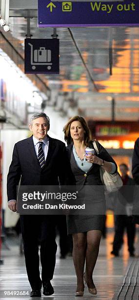 British Prime Minister Gordon Brown and his wife Sarah Brown board a train at Victoria Station on April 16, 2010 in London, England. The General...