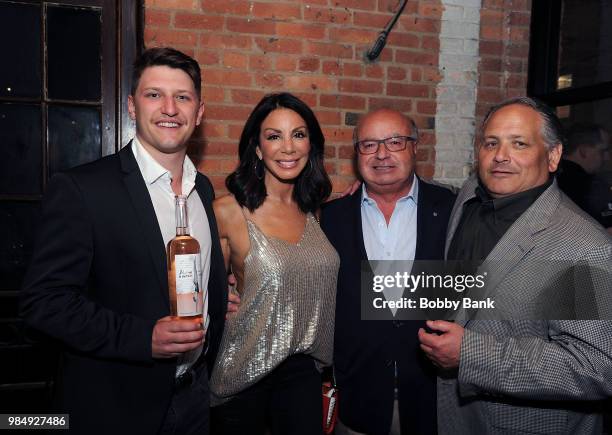 Jesse Bongiovi, Danielle Staub, Barry Berkowitz and Red Bank Mayor Pat Menna attend The Melting Pot of Red Bank Opening at Melting Pot on June 26,...