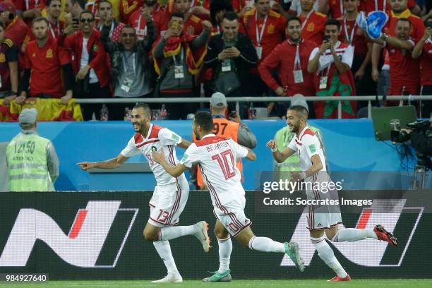 Khalid Boutaib of Morocco celebrates 1-0 with Younes Belhanda of Morocco , Hakim Ziyech of Morocco during the World Cup match between Spain v Morocco...