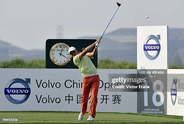 Henrik Stenson of Sweden tees off on the 18th hole during the Round Two of the Volvo China Open on April 16, 2010 in Suzhou, China.