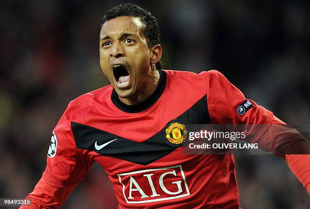 Manchester United's Portugese midfielder Nani celebrates scoring the second goal during the UEFA Champions League second leg quarter-final football...