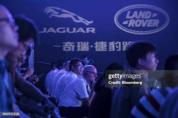 Members of the media attend the opening ceremony for the second phase of the Chery Jaguar Land Rover Automotive Co. Plant in Changshu, China, on...