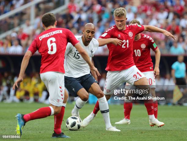 Steven Nzonzi of France controls the ball under pressure of Andreas Christensen and Andreas Cornelius of Denmark during the 2018 FIFA World Cup...