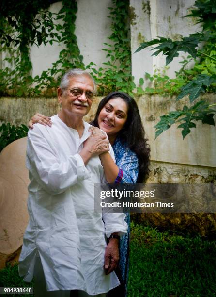 Indian director Meghna Gulzar with her father, Gulzar, at their residence in Bandra, on August 31, 2015 in Mumbai, India.