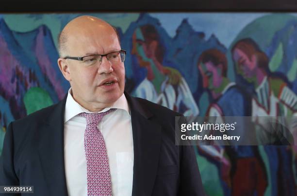 Economy and Energy Minister Peter Altmaier arrives for the weekly German federal Cabinet meeting on June 27, 2018 in Berlin, Germany. High on the...