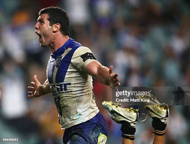 Michael Ennis of the Bulldogs celebrates scoring a try during the round six NRL match between the Wests Tigers and the Canterbury Bulldogs at the...