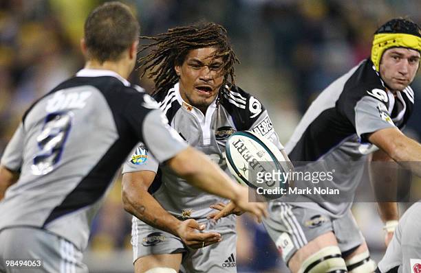Rodney So'oialo of the Hurricanes passes during the round 10 Super 14 match between the Brumbies and the Hurricanes at Canberra Stadium on April 16,...