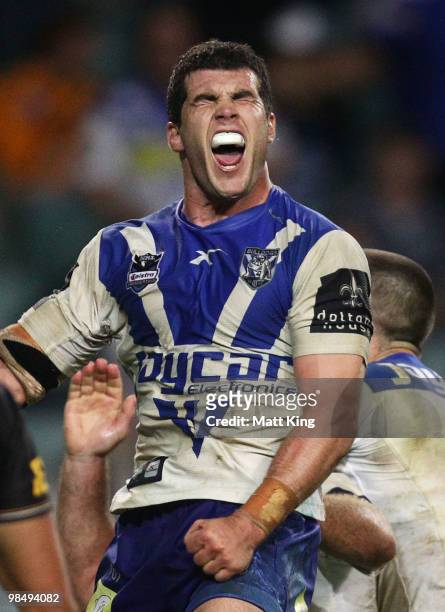 Michael Ennis of the Bulldogs celebrates scoring a try during the round six NRL match between the Wests Tigers and the Canterbury Bulldogs at the...