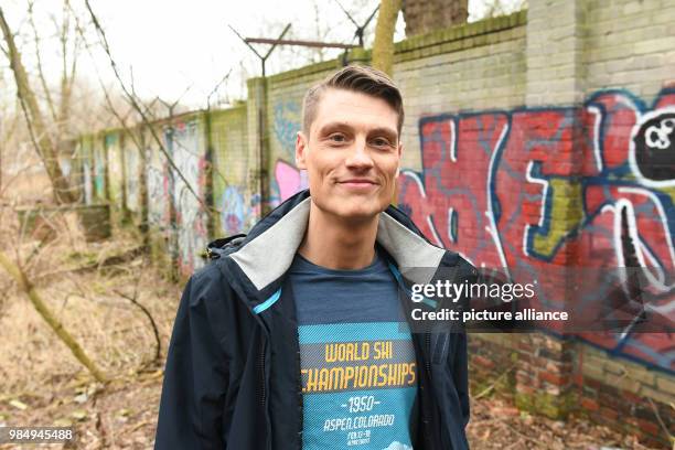 Local historian Christian Bormann stands in front an approximately 80-metre-long piece of the Berlin Wall in Pankwo in Berlin, Germany, 24 January...