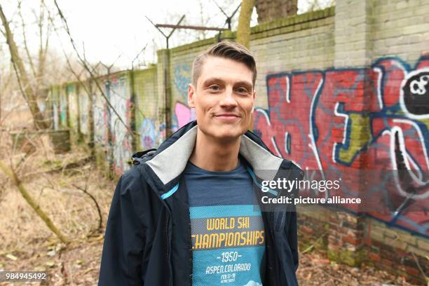 Local historian Christian Bormann stands in front of an approximately 80-metre-long piece of the Berlin Wall in Pankow in Berlin, Germany, 24 January...