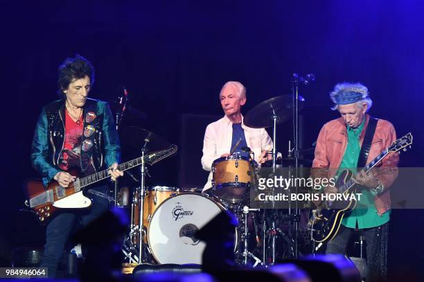 British musicians Ronnie Wood, Charlie Watts and Keith Richards of The Rolling Stones perform during a concert at The Velodrome Stadium in Marseille...