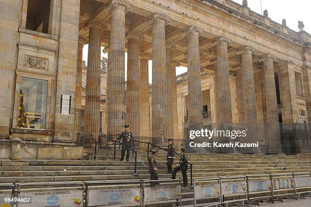 Guards stand in front of Republic's Senate in Bolivar square, in the old part of the city. Bogota, formerly called Santa Fe de Bogota, is the capital...